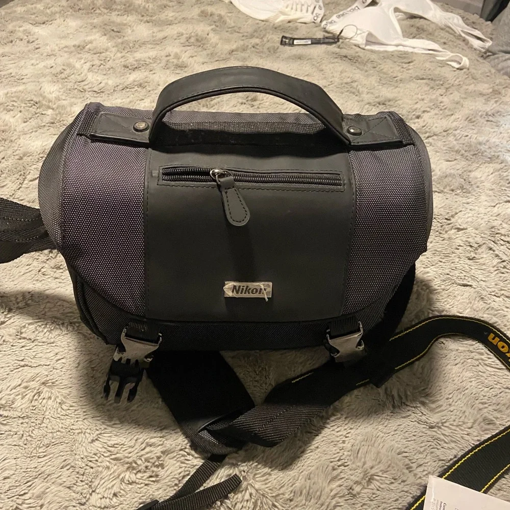 Like new. I am including, the extra lense and bag purchased separately.